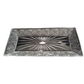 A rectangular cut glass platter with a geometric pattern and a central sunburst design, photographed against a black fabric background.
